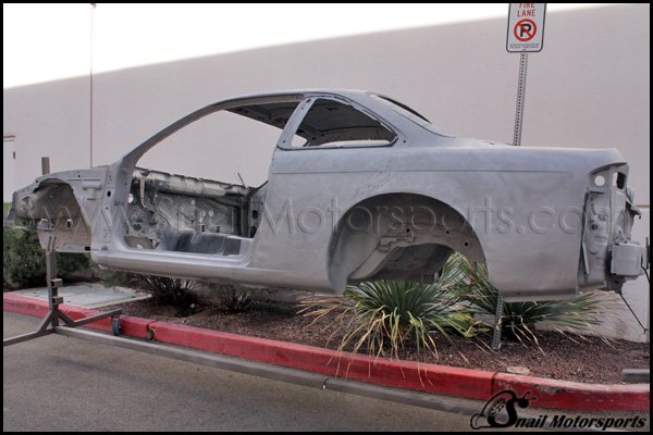 Nissan 240SX side and quarter panel after sand blasting