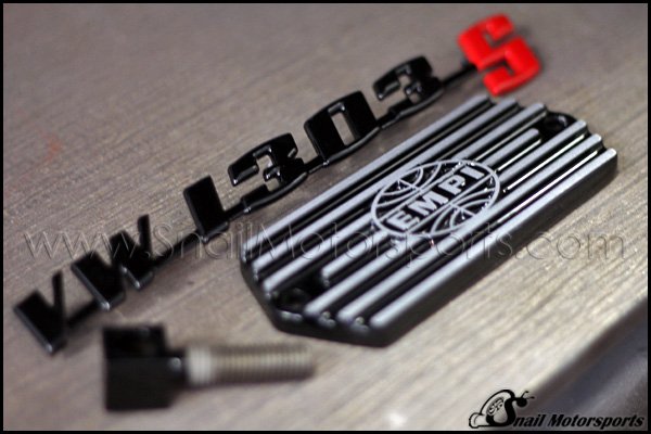 VW bug emblem and cover in two-tone