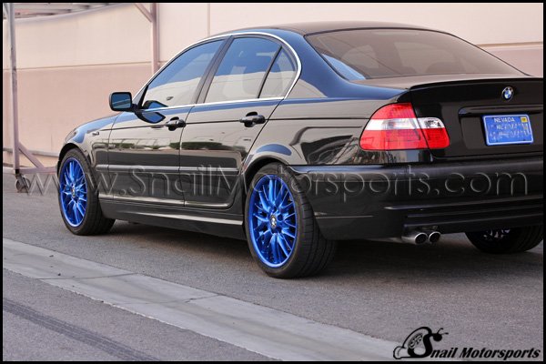 BMW 3 Series sedan with Candy Blue wheels