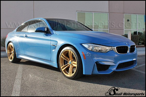 BMW M4 coupe with Prismatic Gold wheels