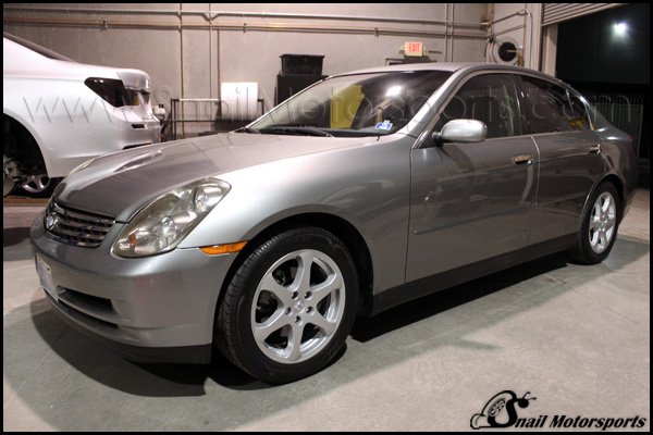 Infini G35 sedan with OEM silver wheels