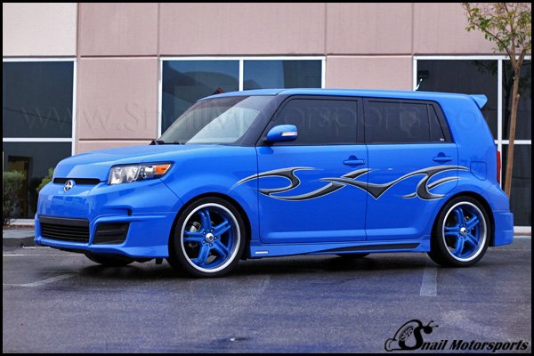 Scion xB with color matched wheels and machined lips