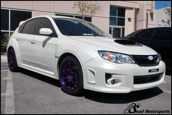 Subaru WRX with Candy Purple wheels