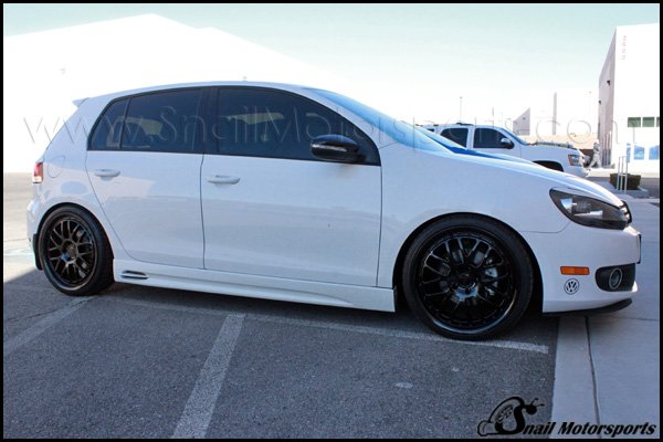 VW Golf TDI with Gloss Black aftermarket wheels