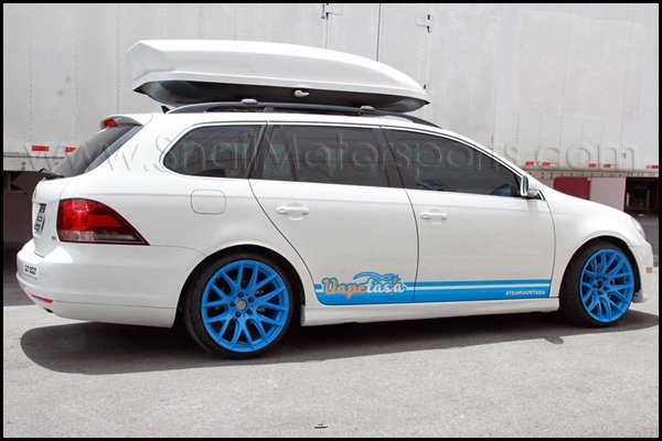 Volkswagen Jetta wagon with Baby Blue wheels